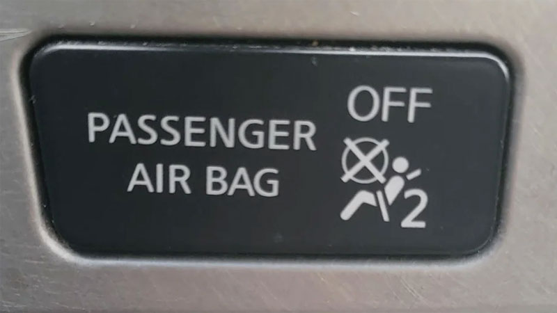 passenger airbag button